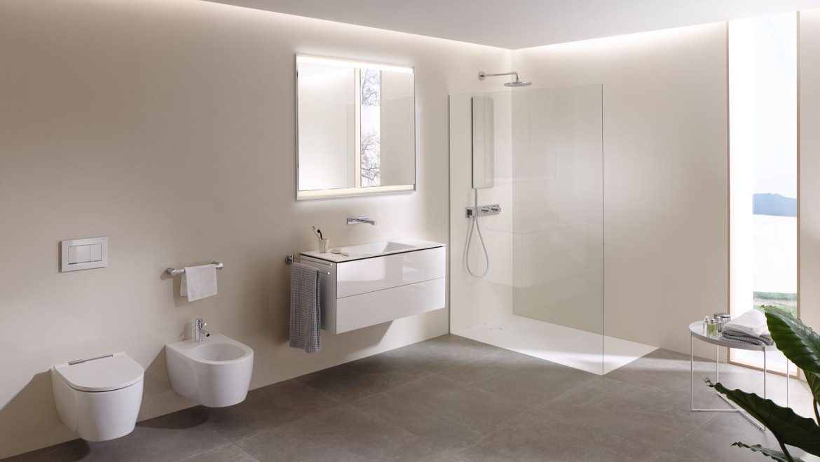 A look a inside with a large bathroom with Geberit AquaClean Mera shower toilet, bathroom furniture and bathroom ceramics