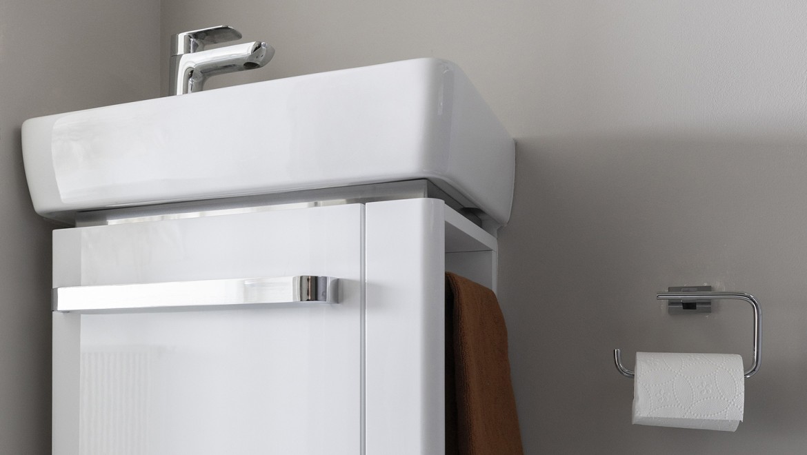 Renova Compact washbasin with matching washbasin cabinet and integrated towel rail