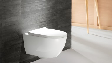 Geberit Acanto WC with actuator plate Sigma70 in red gold