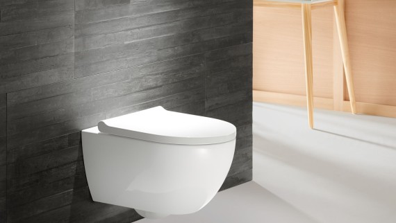 Geberit Acanto WC with actuator plate Sigma70 in red gold Geberit Acanto WC with actuator plate Sigma70 in red gold