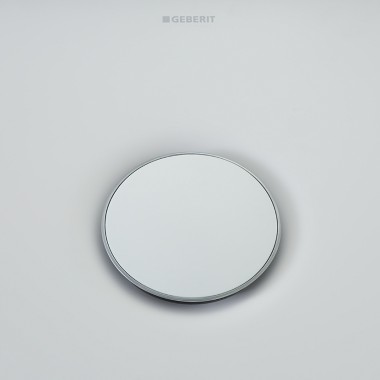 Geberit Olona drain cover sorrounded by a slim chrome ring Geberit Olona drain cover sorrounded by a slim chrome ring