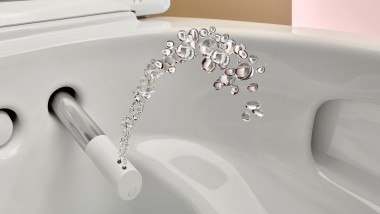 Geberit AquaClean, shower toilet with spray nozzle.