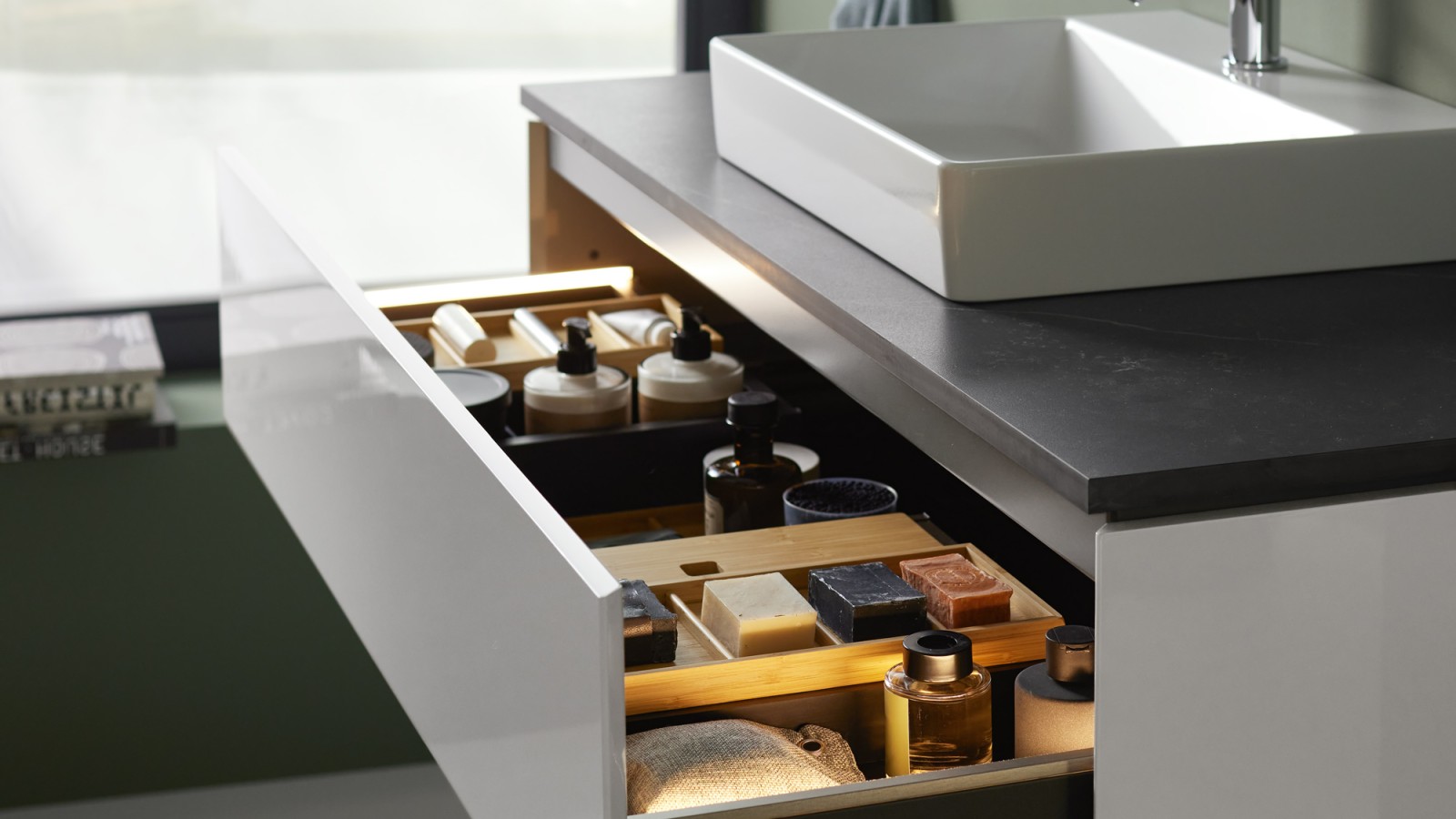 Open Geberit ONE washbasin cabinet with handle-free drawer