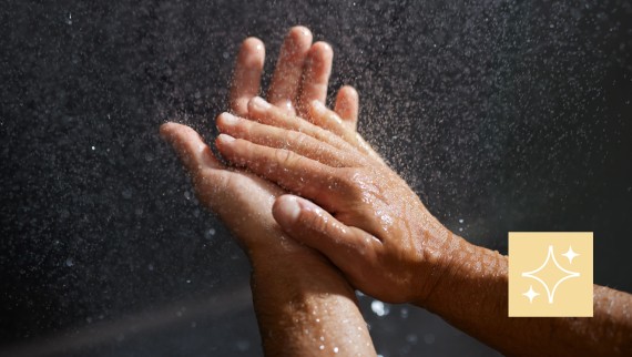 Woman cleaning the Geberit CleanLine shower channel