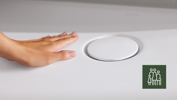 Hands strokes over floor-level CleanFloor30 shower