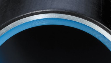 Cross-section of a three-layer Geberit Mepla multilayer pipe