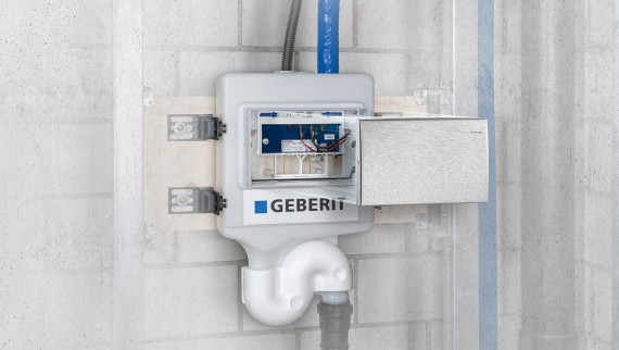 A Geberit HS30 hygiene flush unit installed at the end of a riser pipe (© Geberit) A Geberit HS30 hygiene flush unit installed at the end of a riser pipe (© Geberit)